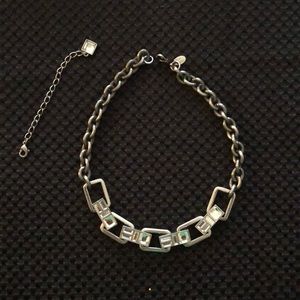 Silver tone chain link necklace.